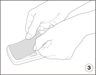 An illustration of magnetic attach strips being applied properly at the front edge of the monitor frame.