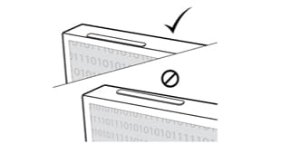 An illustration of magnetic attach strips being applied properly at the front edge of the monitor frame.