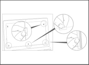 Illustration of slide mount tabs positioned and adhered to bezel around computer screen.